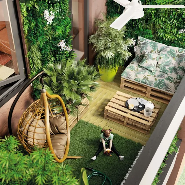 Un tappeto di erba sintetica dove il tuo cane sul balcone può giocare e farsi fare le coccole - Idea Leroy Merlin
