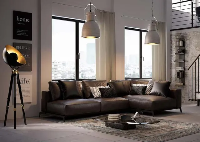 Il living in stile Labo è caratterizzato dalla zona relax con un grande divano ad L e morbidi cuscini che riprendono i colori della palette. - foto Leroy Merlin