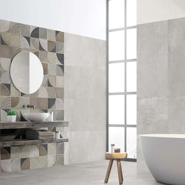 Piastrelle con decori geometrici e effetti 3D  e il bagno si fa ampio e luminoso - Idea Leroy Merlin